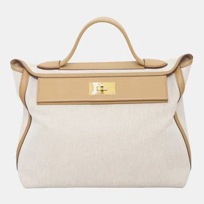 Pre-owned Hermes Sesame Canvas Swift Leather 24/24 35 Bag In Beige