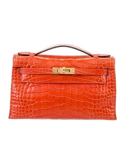 Pre-owned Hermes Shiny Alligator Kelly Pochette In Orange
