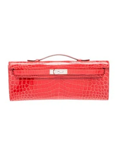 Pre-owned Hermes Shiny Niloticus Crocodile Kelly Cut Clutch In Red