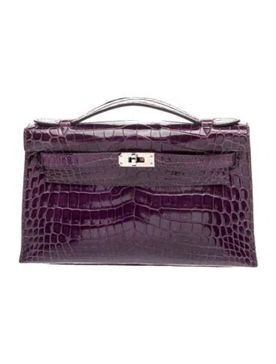 Pre-owned Hermes Shiny Niloticus Crocodile Kelly Pochette In Purple