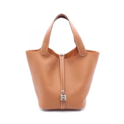 Pre-owned Hermes Taurillon Clemence Leather Handbag () In Brown