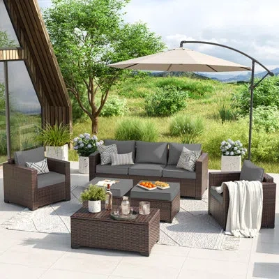 Hermes Wicker Sofa Seating Group With Storage Deck Box And Ottomans In Gray