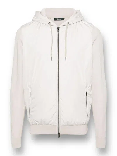 Herno Knitted-panelled Zipped Hooded Drawstring Jacket  In Ice