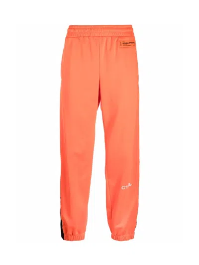 Heron Preston Ctnmb Logo Trackpants In Orange