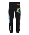 Heron Preston All-over Printed Trousers In Black