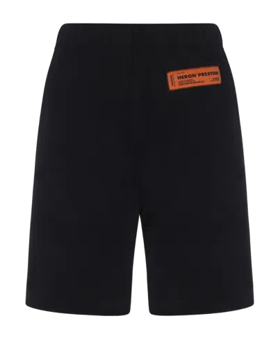 Heron Preston Logo-patch Organic-cotton Knee-length Shorts In Black