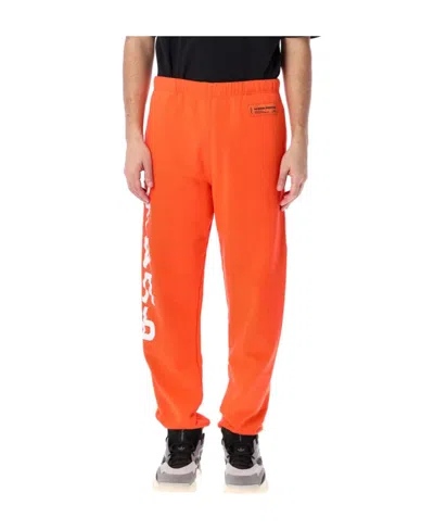 Heron Preston Logo Printed Sweatpants In Orange