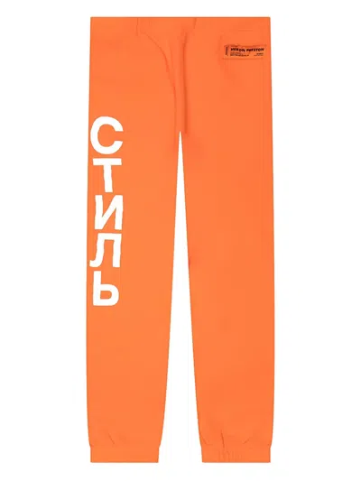 Heron Preston Vertical Logo Track Pants In Orange