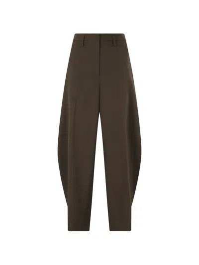 Herskind Dante Pleated Tapered Trousers In Brown