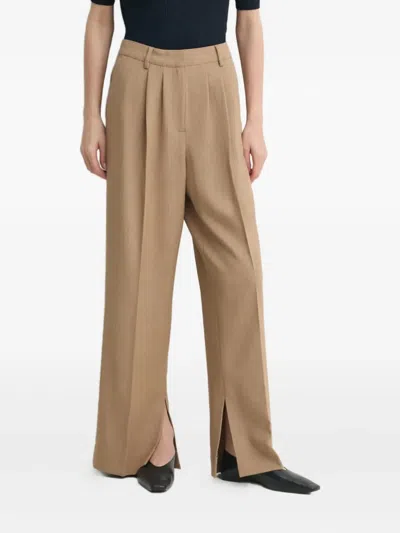 HERSKIND RUPERT SPLIT-HEM TROUSERS