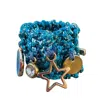 Hilo De Mar Women's Blue / Gold Turquoise Blue And Gold Handkitted Ring - With Charms - Elastic