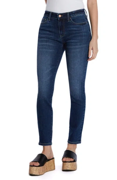Hint Of Blu Mid Rise Skinny Jeans In Rocked Indigo