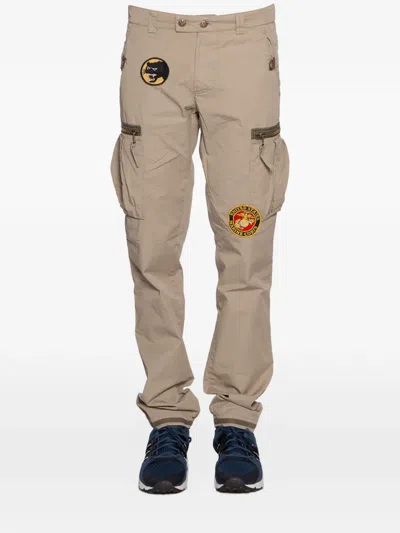 History Repeats Patch-embellished Cargo Trousers In Brown