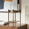 Hivvago 14" Bronze And Clear Glass And Metal Tabletop Hurricane Candle Holder In Gold