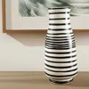 Hivvago 18" Black And White Striped Round Ceramic Table Vase In Black