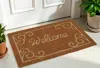 Hivvago 18" X 30" Beige And White Coir Vines Welcome Outdoor Door Mat In Brown