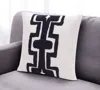 Hivvago 20" Black And Ivory Cotton Geometric Throw Pillow In Black