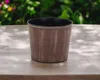 Hivvago 7" Brown And Ivory Textural Tone On Tone Recycled Plastic Indoor Outdoor Round Pot Planter In Brown