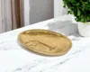 Hivvago 8" Gold Cast Iron Mod Abstract Face Oval Trinket Tray In Gold