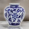 Hivvago 9 Inch Porcelain Vase, Blue Persian Print, Curved Shape, Flared Opening In Blue