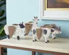 Hivvago Set Of Four Black And White Polyresin Farm Animal Figurines With Vases In Multi