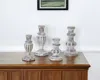 Hivvago Set Of Four White Washed Resin Tabletop Candle Sticks In Silver
