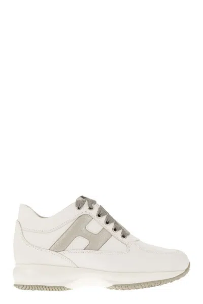 HOGAN ELEGANT WHITE LEATHER TRAINER FOR WOMEN WITH SHINY FABRIC SIDE H AND REMOVABLE SHAFT