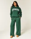 Hollister Senior Graphic Baggy Sweatpants In Green