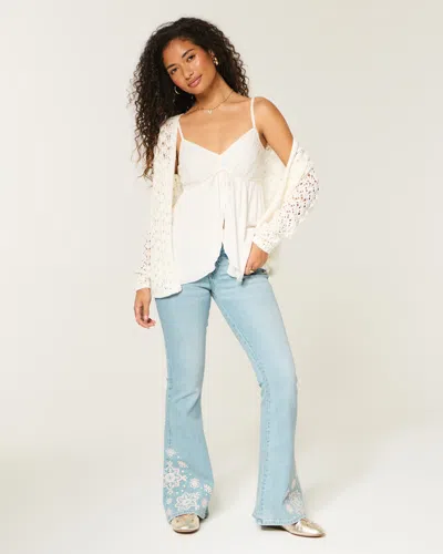 Hollister Ultra Low-rise Light Wash Floral Embroidery Flare Jeans In Blue