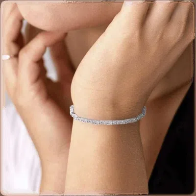 Hollywood Sensation Dainty Cubic Zirconia Tennis Bracelet With Emerald And Round Cut Cz In Silver