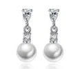 Hollywood Sensation Pearl Drop Earrings With Cubic Zirconia  Accents Earrings In Silver