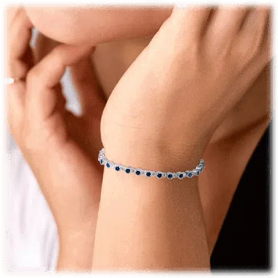 Hollywood Sensation Sapphire And White Diamond Tennis Bracelet With Round Cut Cubic Zirconia In Silver