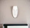 Homezia 10" White Mod Abstract Face Ceramic Wall Decor