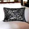 Homezia 12" X 20" Black And Silver Cowhide Throw Pillow