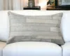 Homezia 12" X 20" Gray Cowhide Throw Pillow