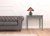Homezia 17" Rust Metal Two Light Round Table Lamp With Amber Empire Shade