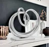 Homezia 17" Silver Buffed Aluminum Tabletop Sculpture