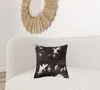 Homezia 18" X 18" X 5" Chocolate And White Quattro Pillow