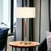 Homezia 25" Gold And Oak Metal Two Light Table Lamp With White Drum Shade