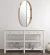 Homezia 34" Bronze Oval Steel Framed Accent Mirror