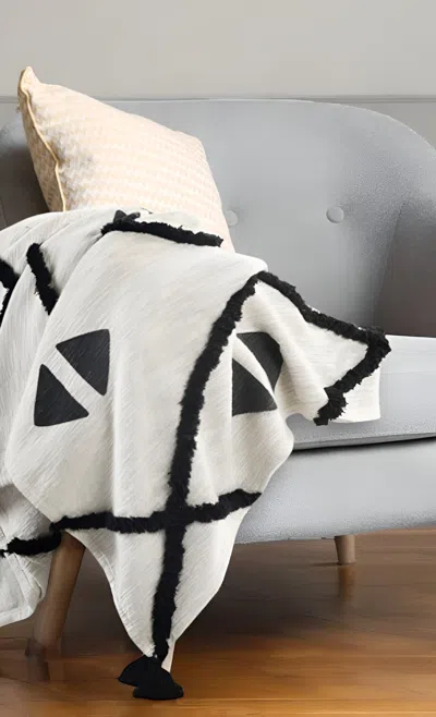 Homezia 50" X 60" Black And White Woven Cotton Geometric Throw Blanket With Tassels