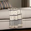 Homezia Beige And Black Woven Wool Solid Color Reversable Throw