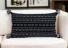 Homezia Black And Gray X Pom Throw Pillow