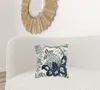 Homezia Blue Ivory Flower Pod Down Filled Throw Pillow