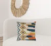 Homezia Blue Mustard Ikat Pattern Throw Pillow