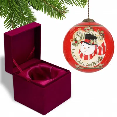 Homezia Festive Snowman On His Way Hand Painted Mouth Blown Glass Ornament In Multi