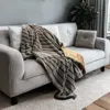 Homezia Gray Faux Fur Striped Plush Throw