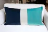 Homezia Navy Blue And Sea Blue Quilted Colorblock Velvet Lumbar Throw Pillow