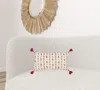 Homezia Red Beige Tribal Inspired Tasseled Lumbar Pillow