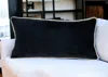 Homezia Reversible Black And White Lumbar Velvet Throw Pillow